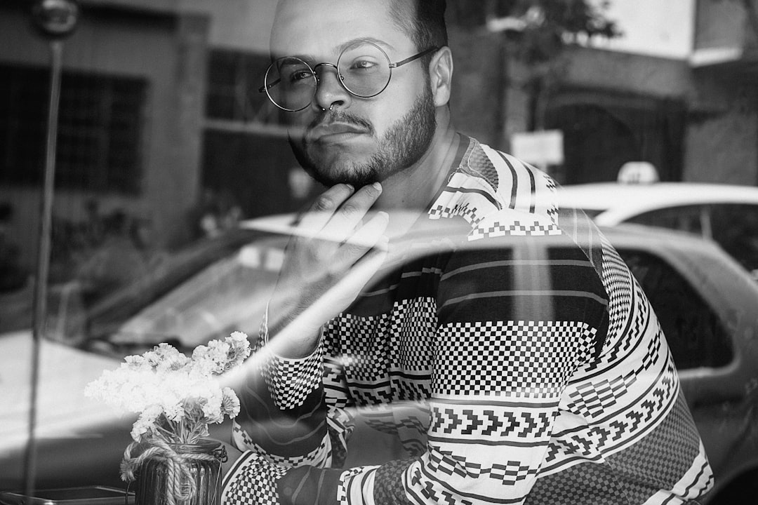 man-looking-out-window-2yijjpe3b0o